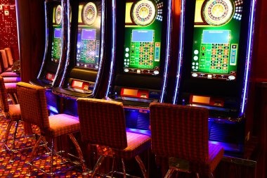 Live dealer studio with multiple camera angles showing Andar Bahar table